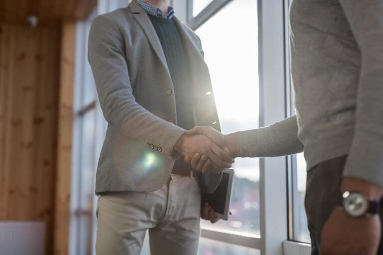 Two men shaking hands