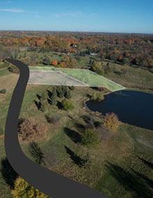 A plot of land near a pond in Lakeview Orono