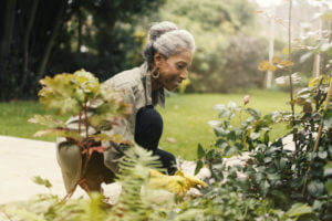 A woman working on her yard