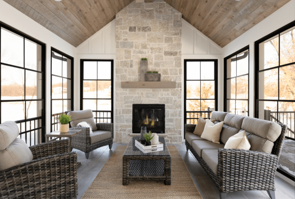 Screen porch with stone fireplace